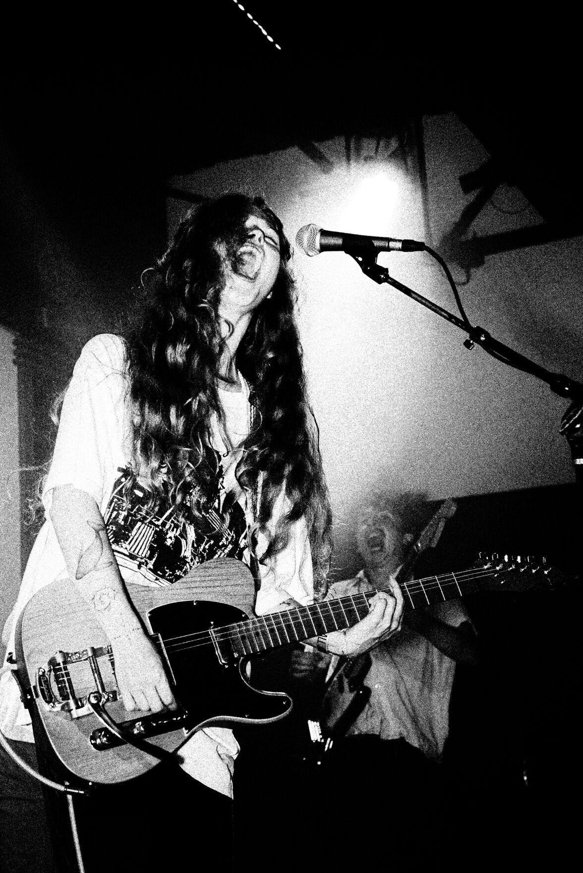 Mercury performs live in the studio at Blackbird, black and white pic of artist playing a Telecaster